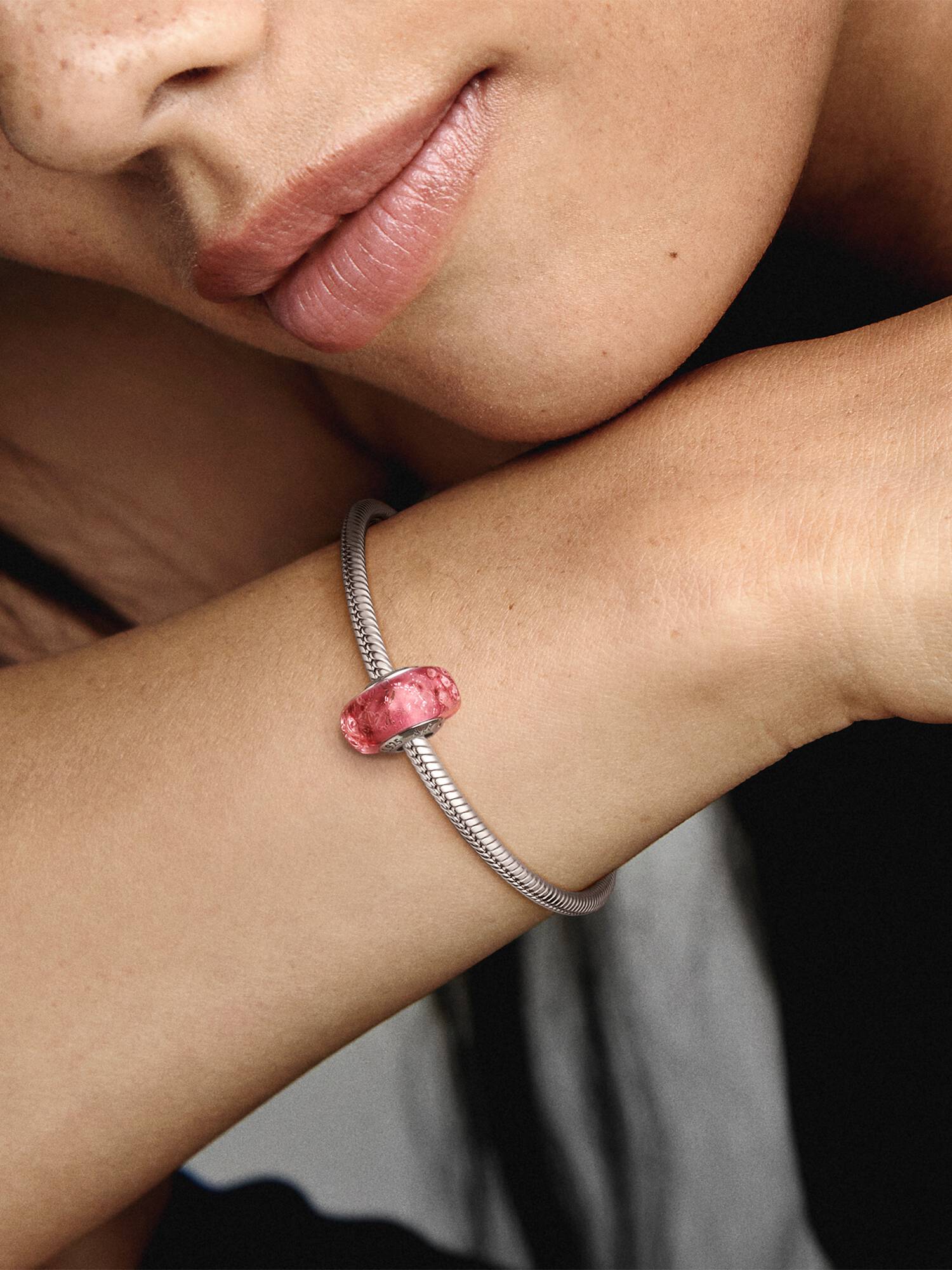 Wavy sterling silver charm with iridescent and pink Murano glass